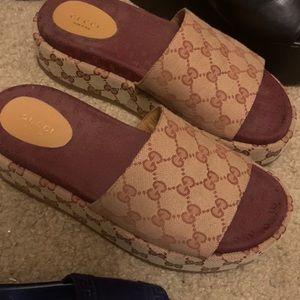 Women’s Gucci tan & burgundy platform sandals.